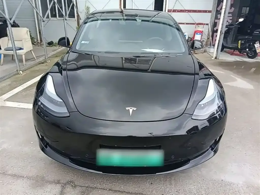 Tesla Model 3 — фото 7