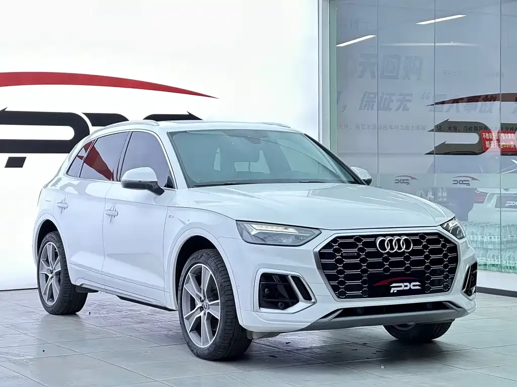 Audi Q5L — фото 6