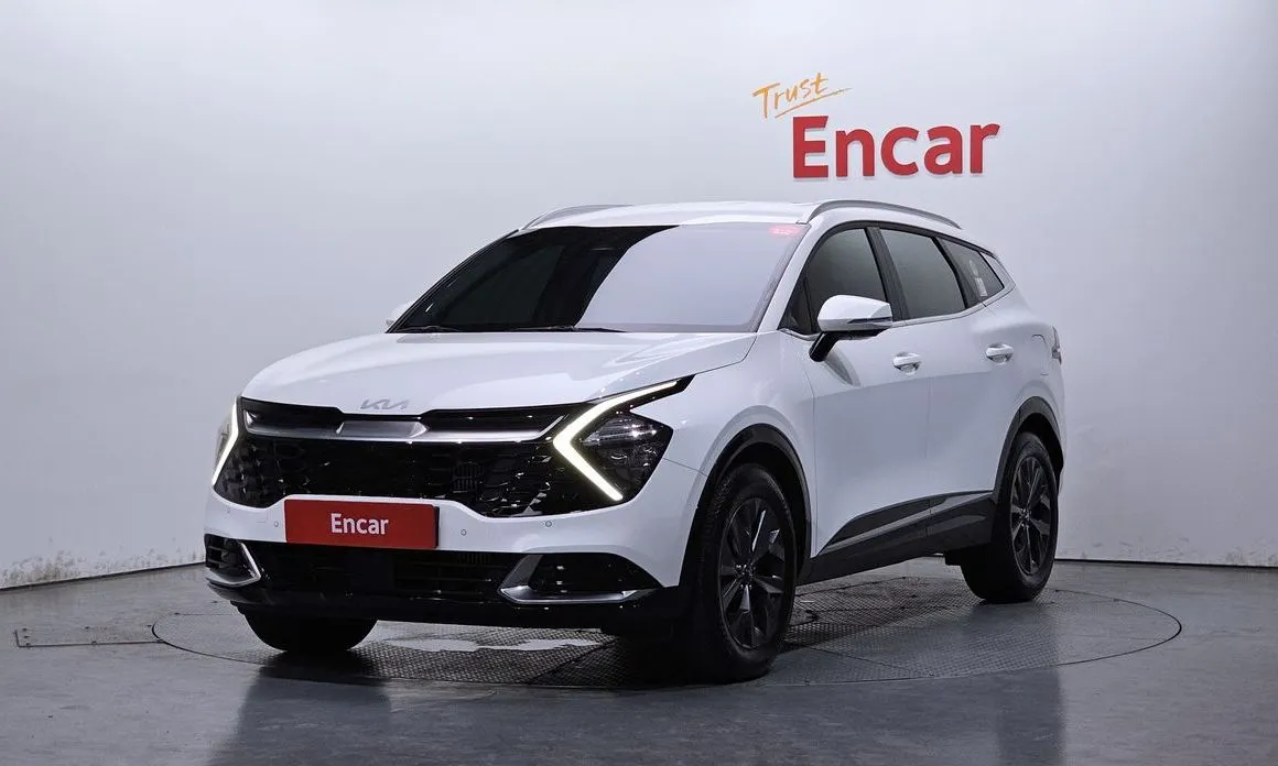 Kia Sportage — фото 1