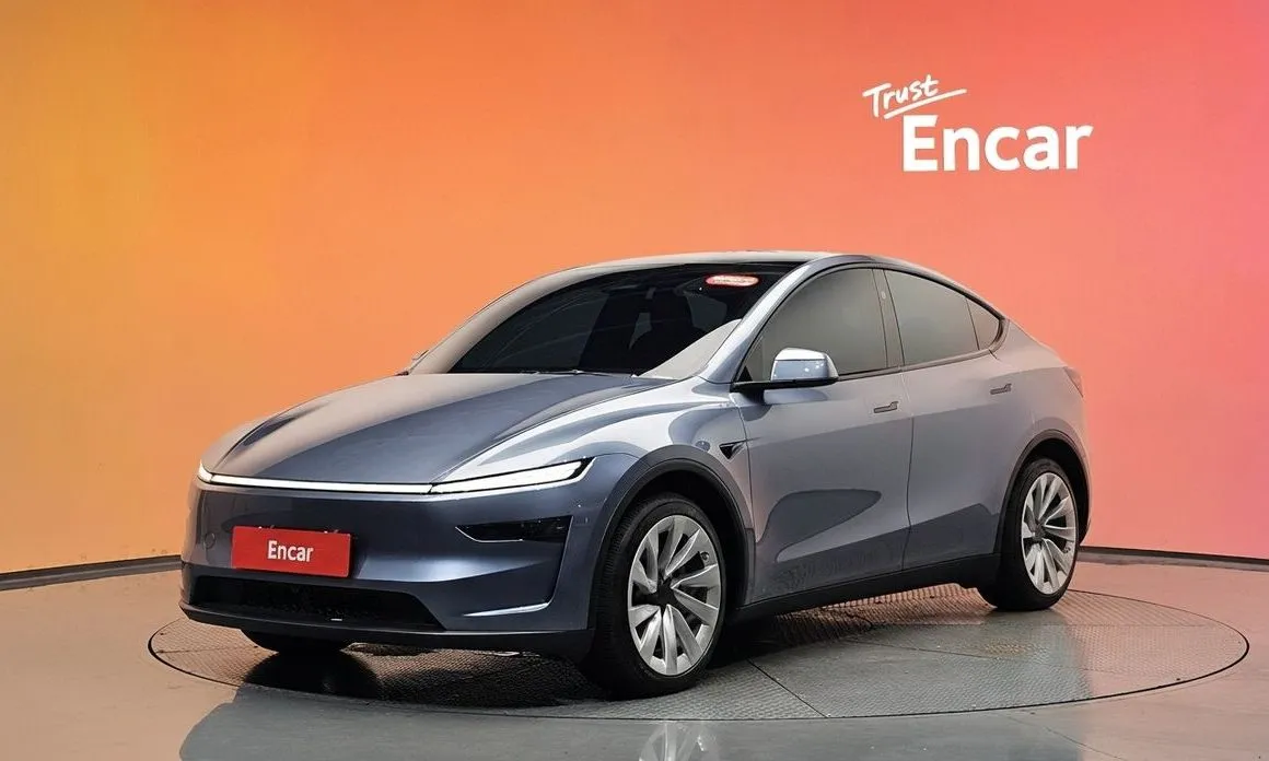 Tesla Model Y — фото 1