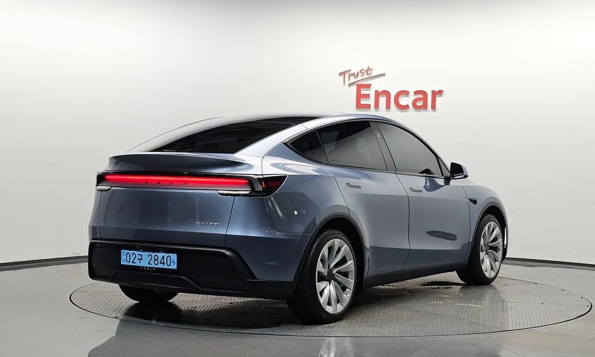 Tesla Model Y — фото 7