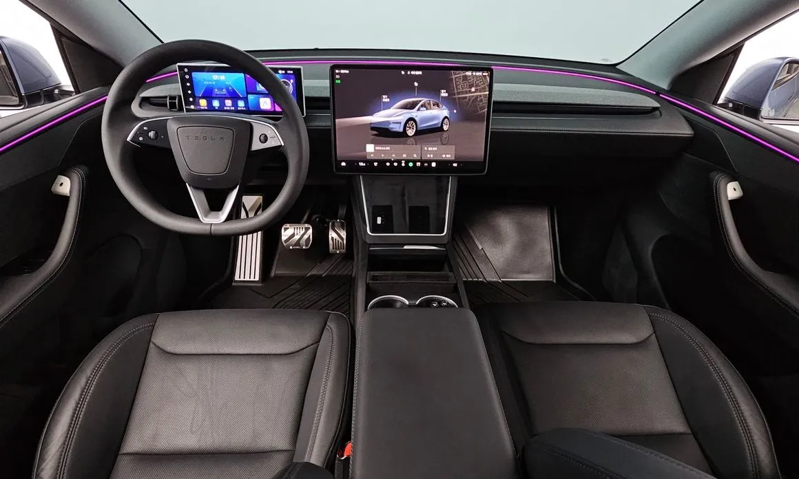 Tesla Model Y — фото 10