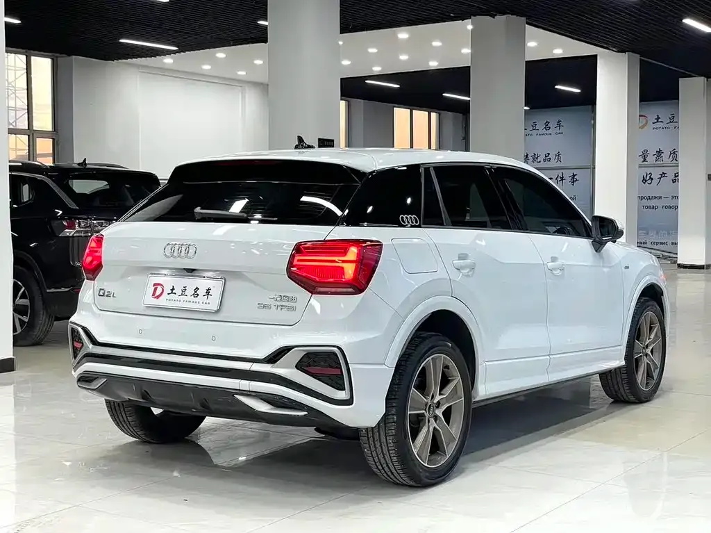 Audi Q2L — фото 7