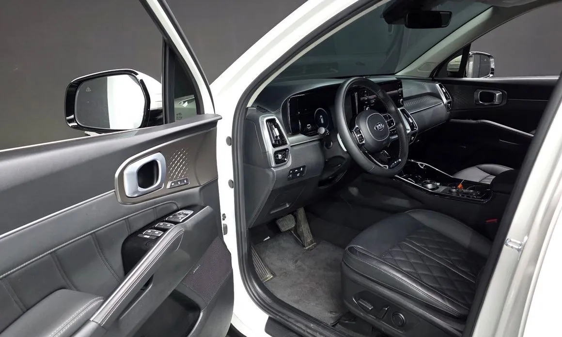 Kia Sorento — фото 7