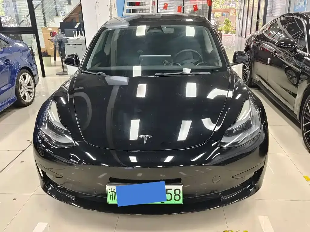 Tesla Model 3 — фото 9