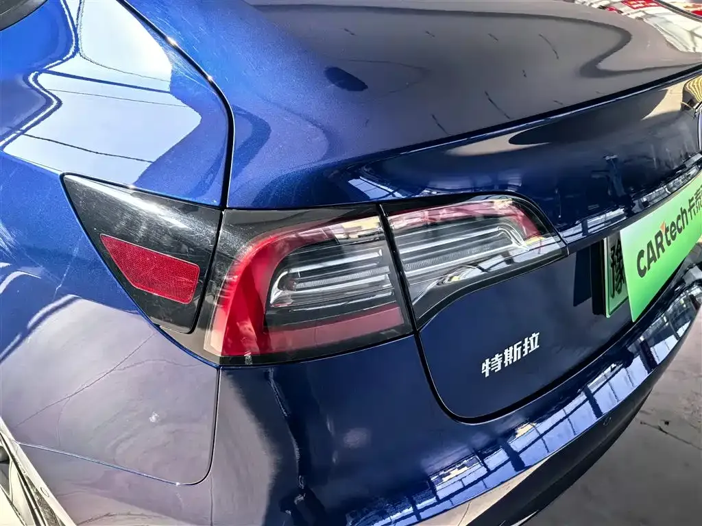 Tesla Model 3 — фото 10