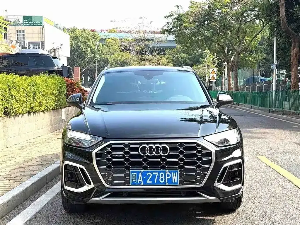 Audi Q5L — фото 10