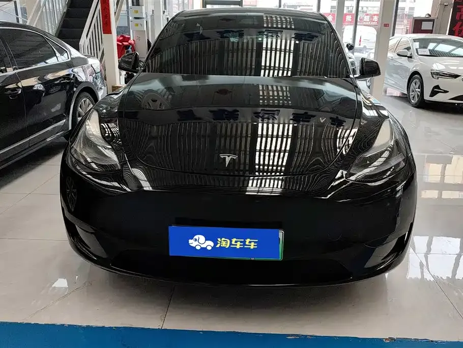 Tesla Model Y — фото 9