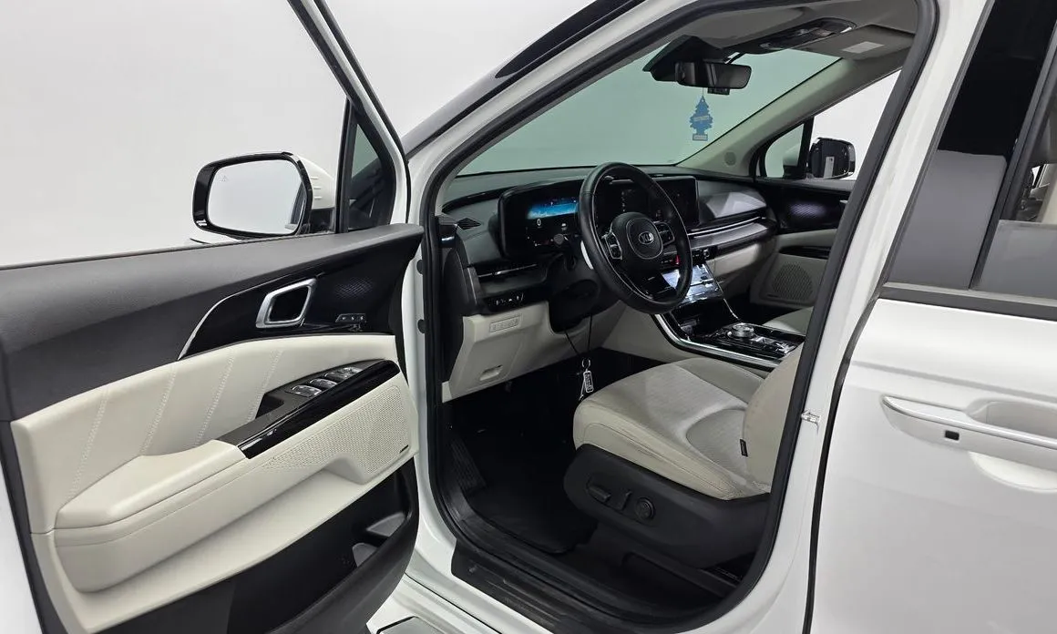 Kia Carnival — фото 10