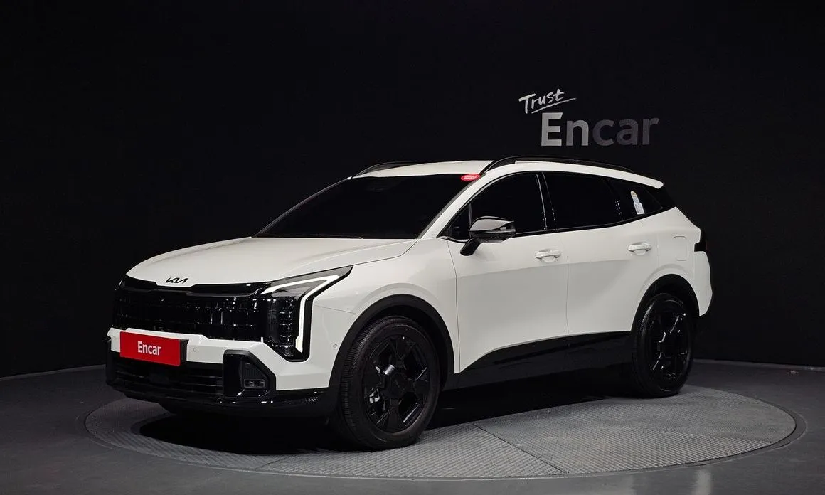 Kia Sportage — фото 1