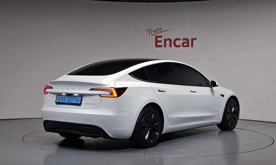 Tesla Model 3 — фото 9