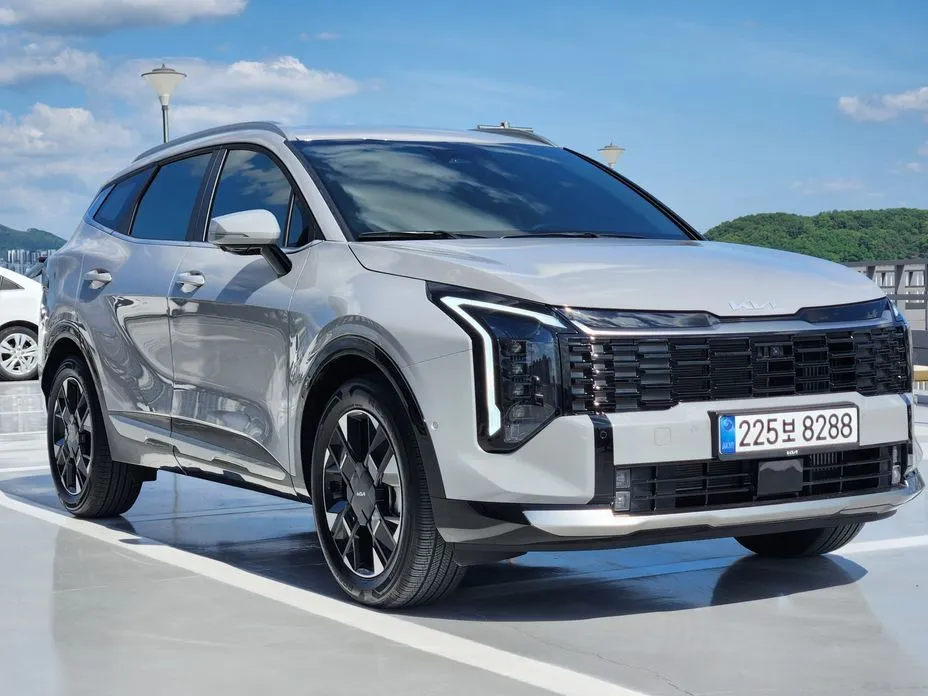 Kia Sportage — фото 10