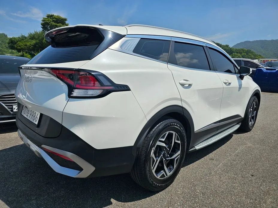 Kia Sportage — фото 9