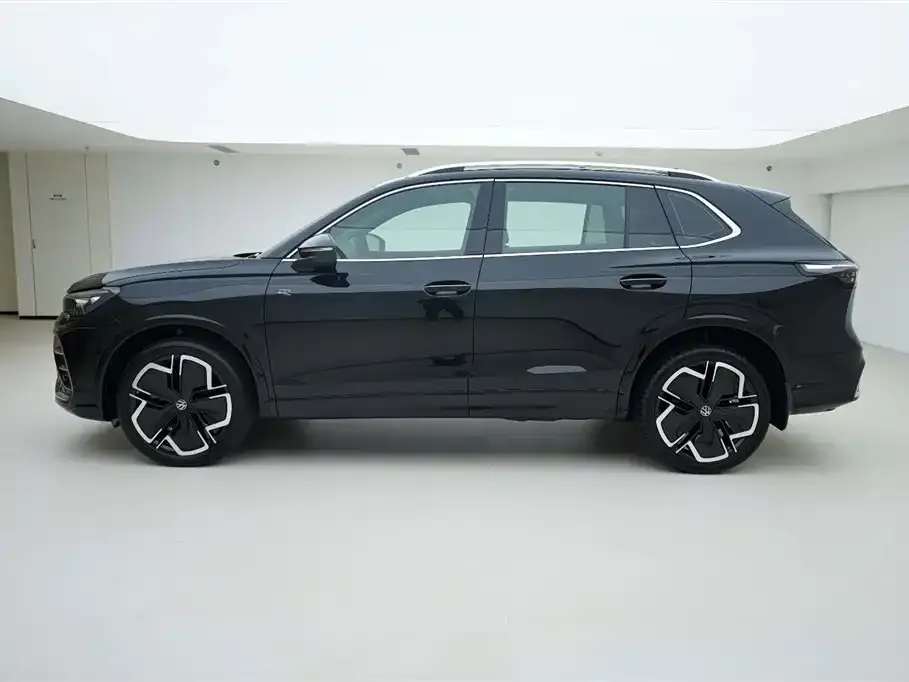 Volkswagen Tiguan L — фото 3