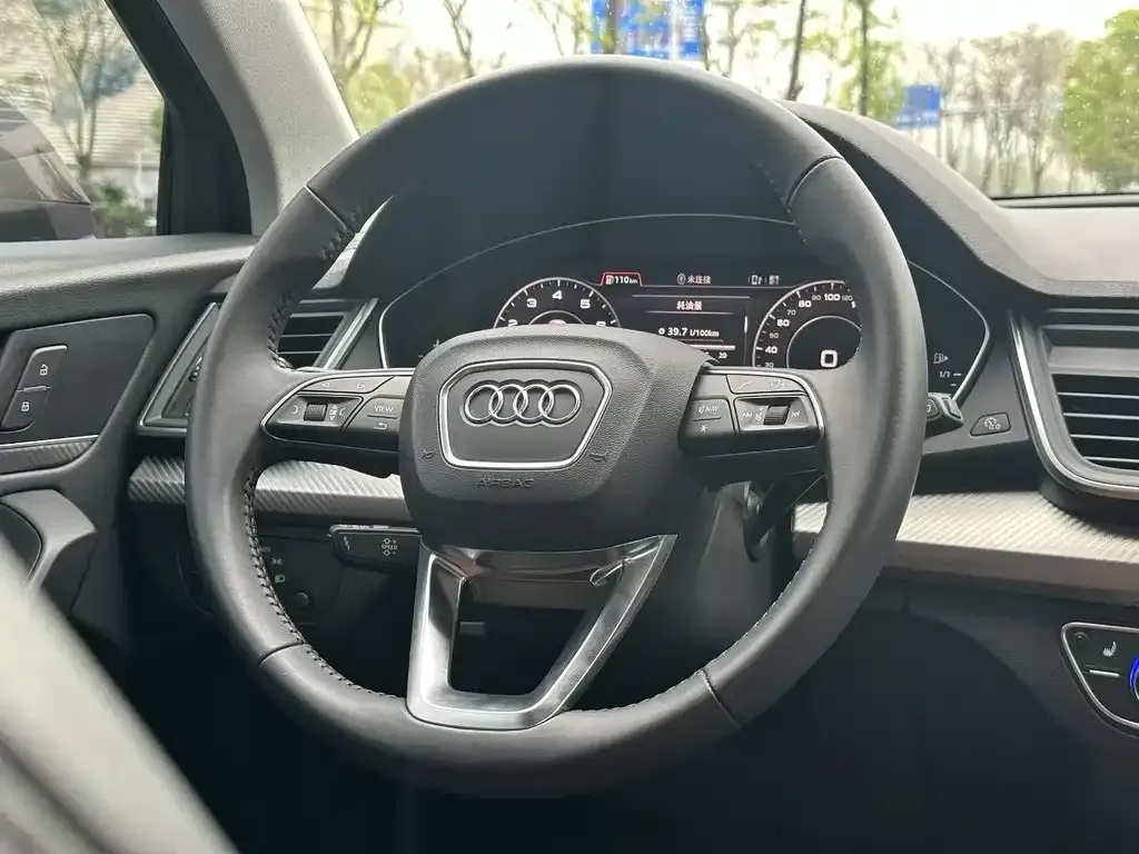 Audi Q5L — фото 7