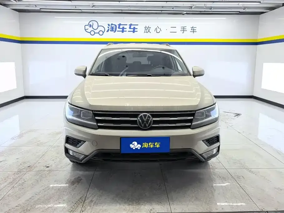 Volkswagen Tiguan L — фото 10