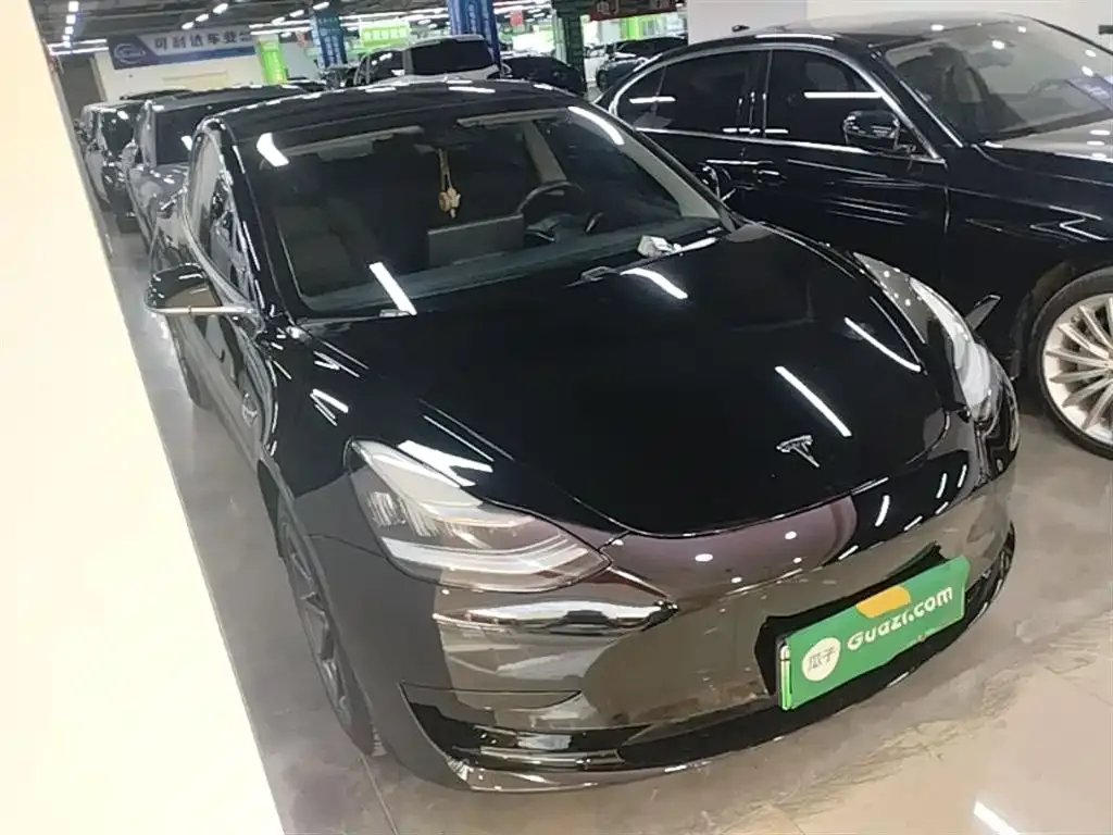 Tesla Model 3 — фото 10