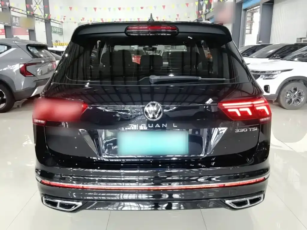 Volkswagen Tiguan L — фото 7