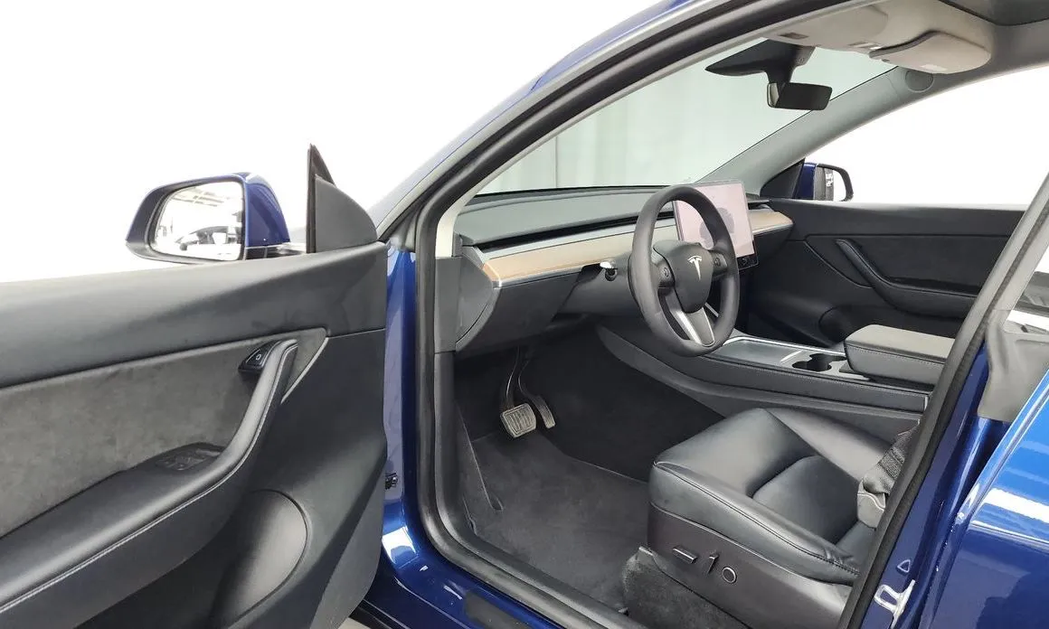 Tesla Model Y — фото 7