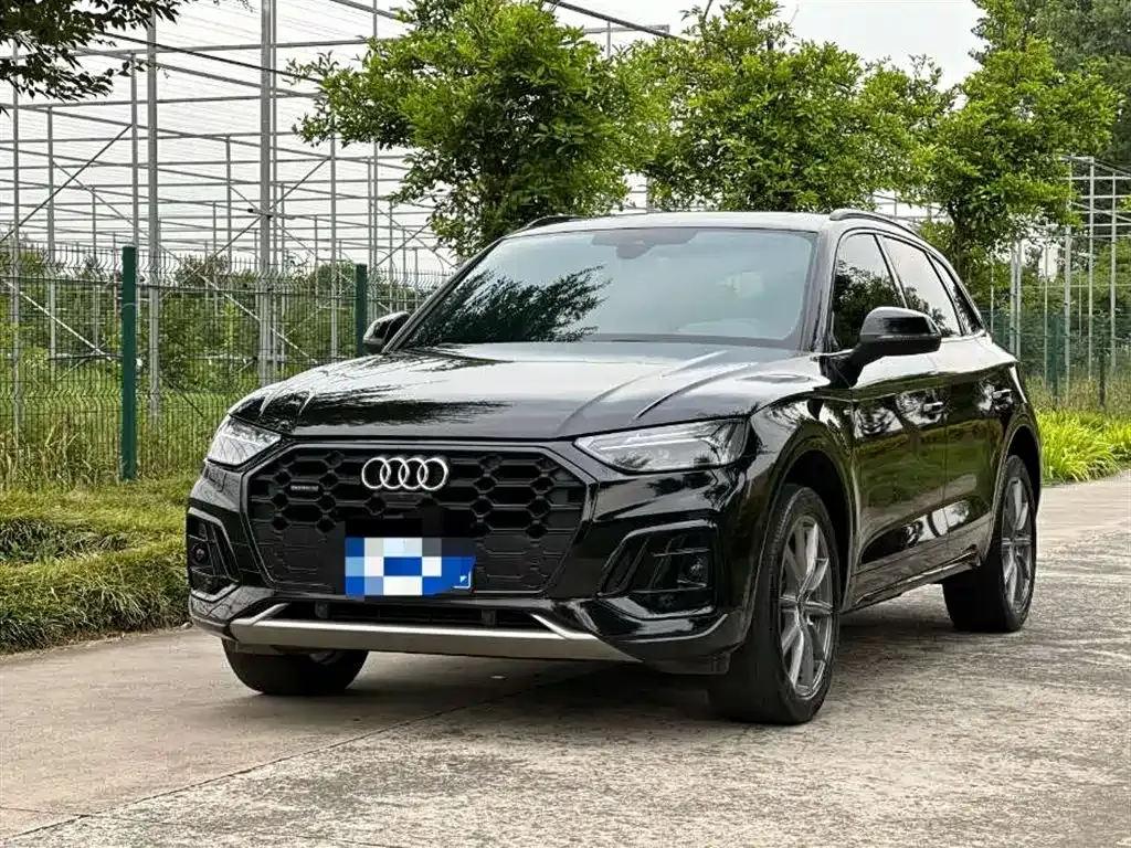 Audi Q5L — фото 6