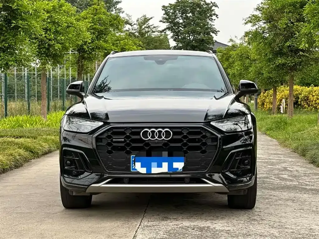 Audi Q5L — фото 10