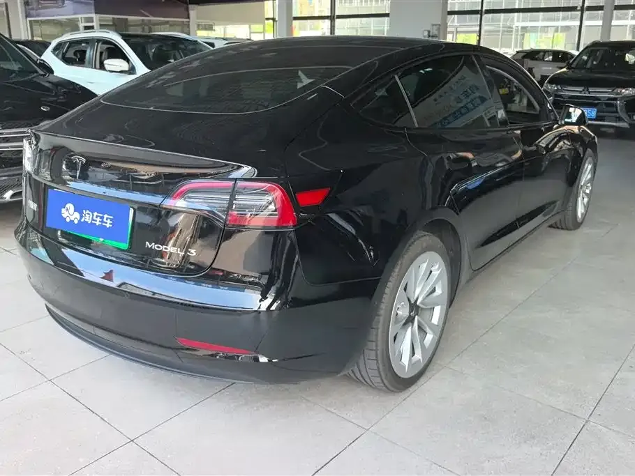 Tesla Model 3 — фото 5