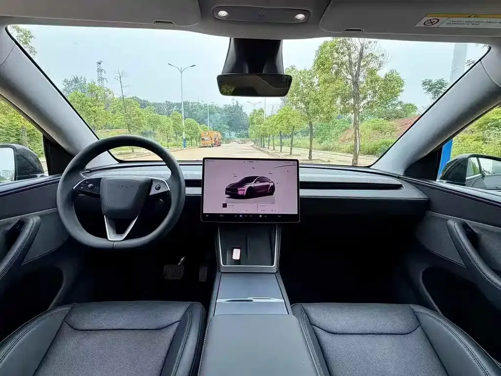 Tesla Model Y — фото 9