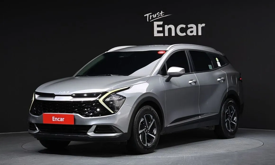 Kia Sportage — фото 1