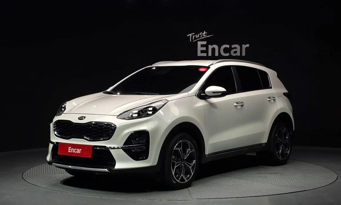 Kia Sportage — фото 1