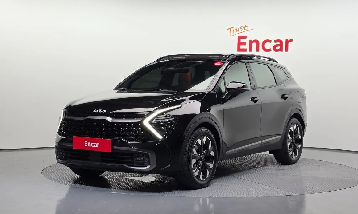 Kia Sportage — фото 1