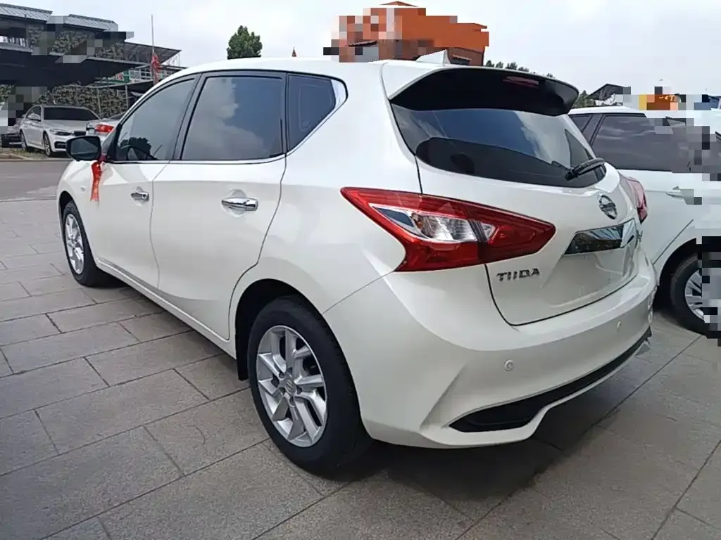 Nissan Tiida — фото 8
