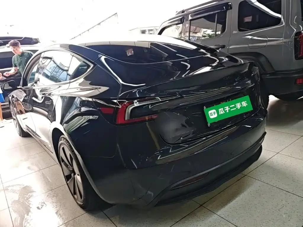 Tesla Model 3 — фото 7