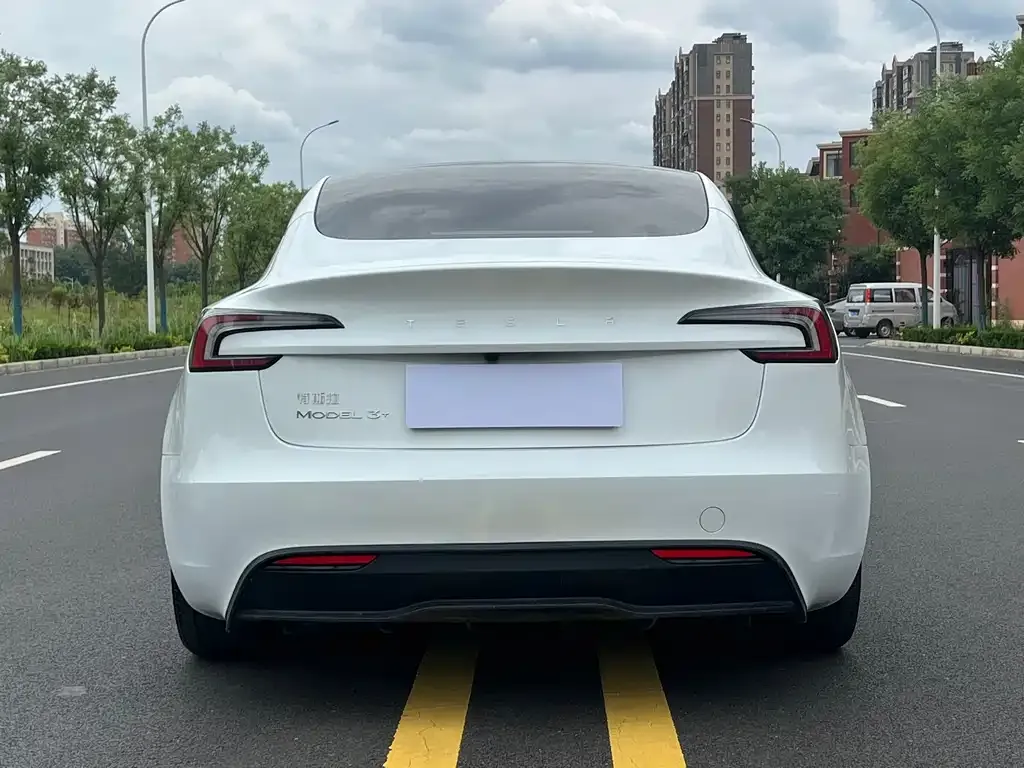 Tesla Model 3 — фото 5