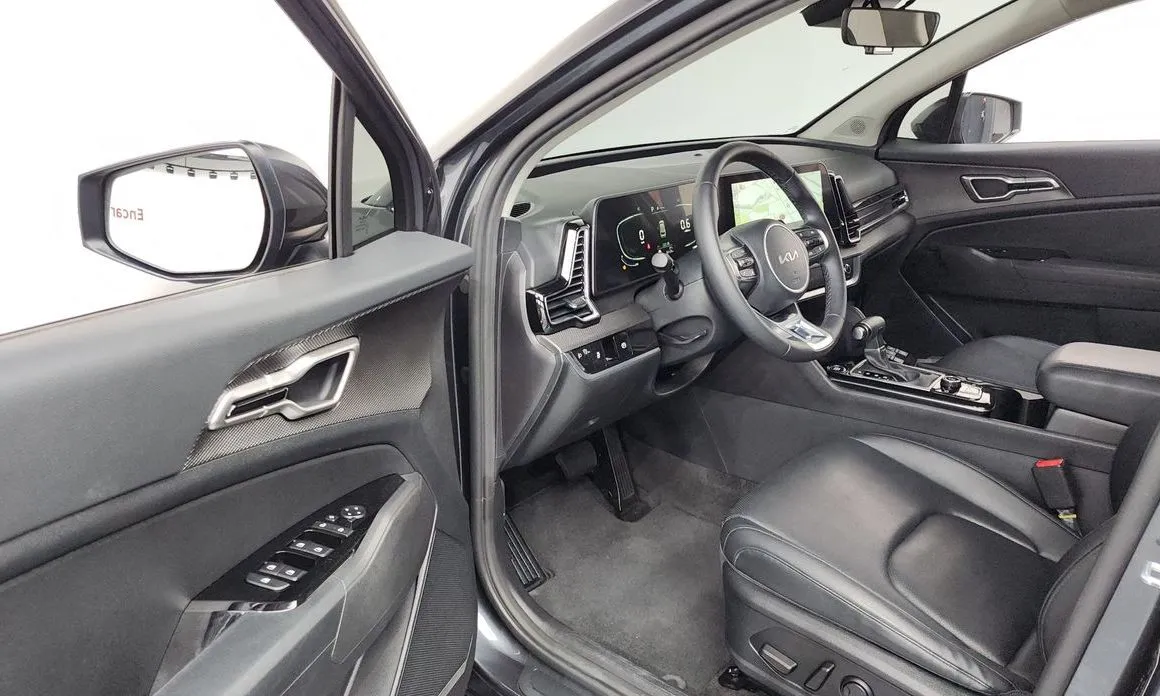 Kia Sportage — фото 9