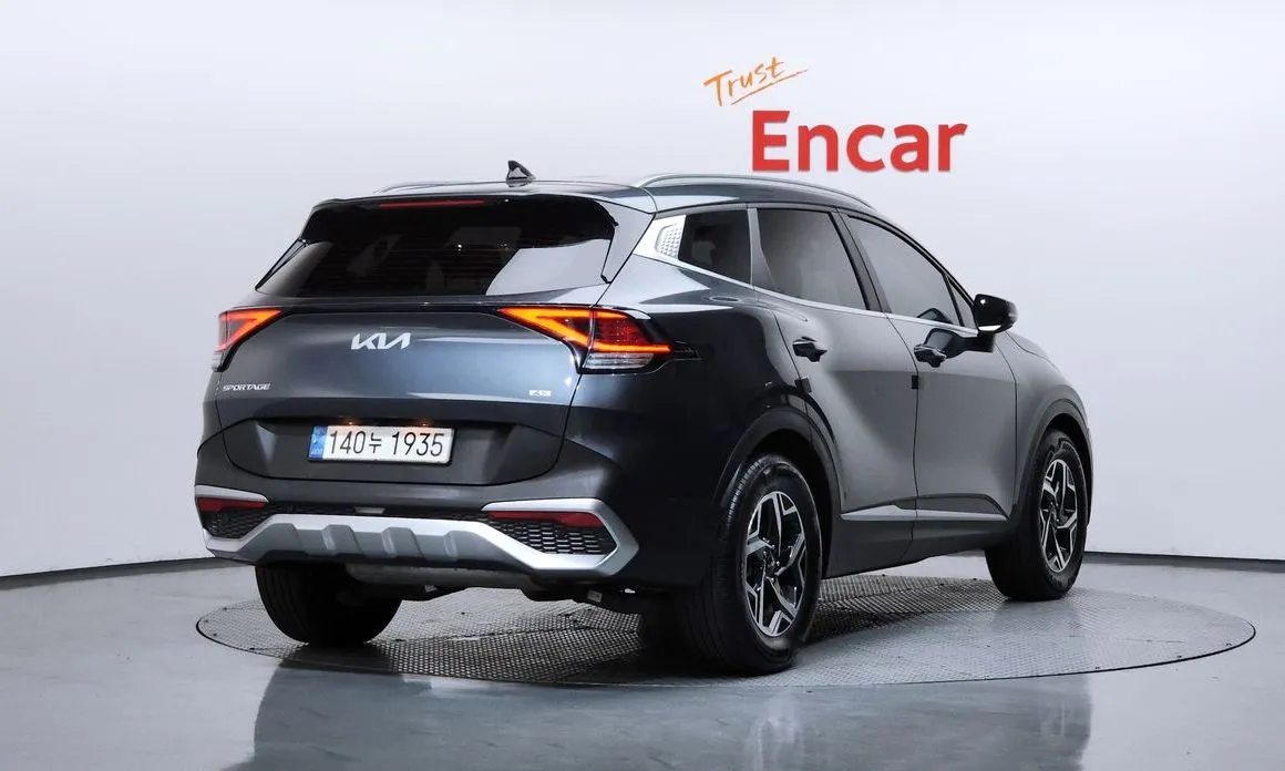 Kia Sportage — фото 10