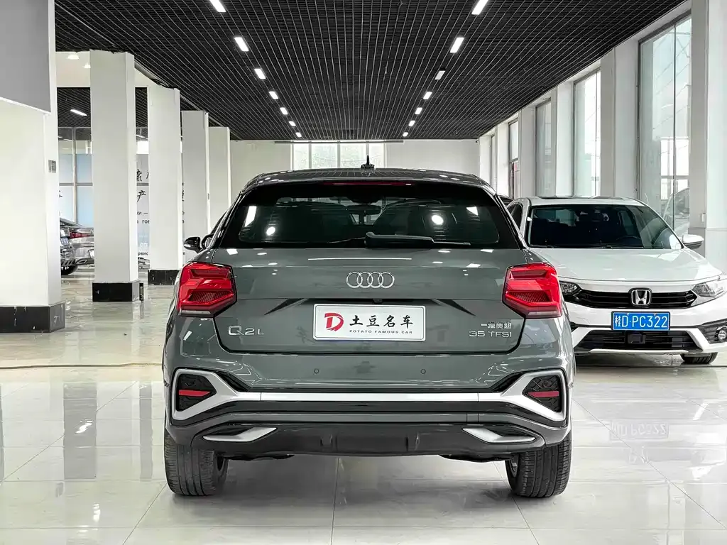 Audi Q2L — фото 6