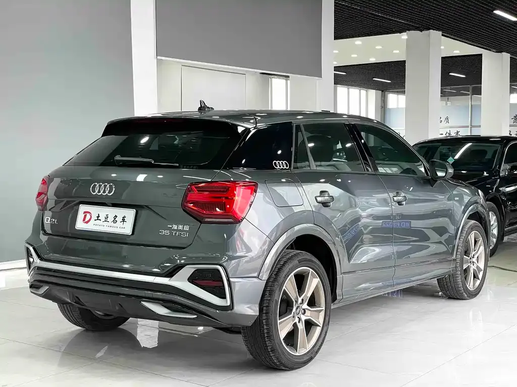 Audi Q2L — фото 9