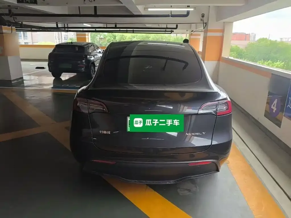 Tesla Model Y — фото 10
