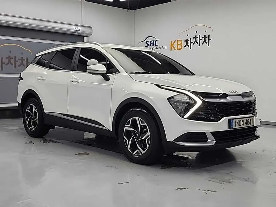 Kia Sportage — фото 5