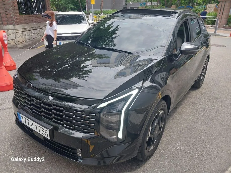 Kia Sportage — фото 1