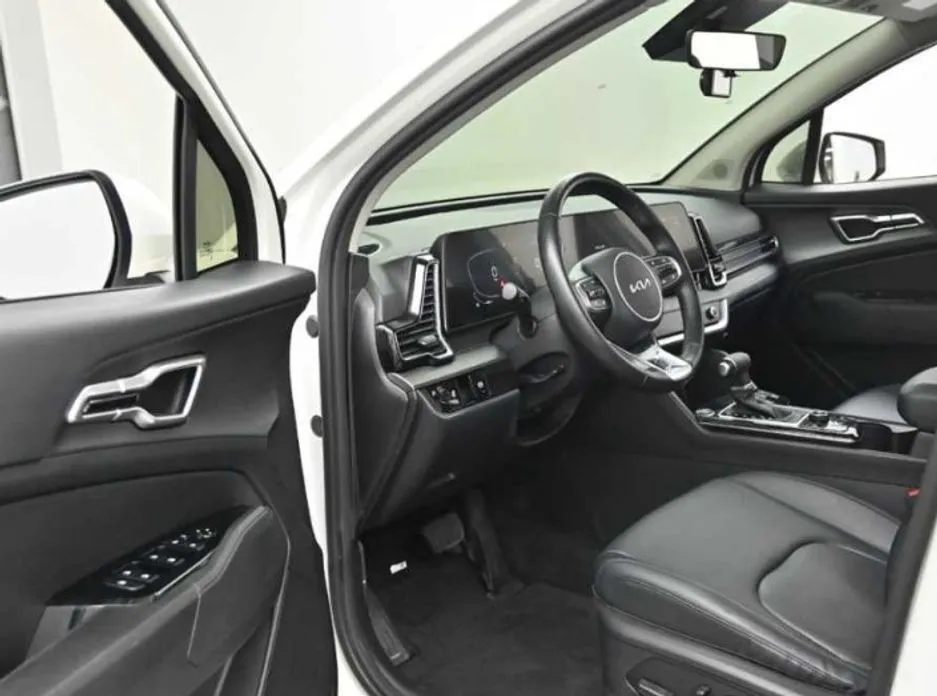 Kia Sportage — фото 10