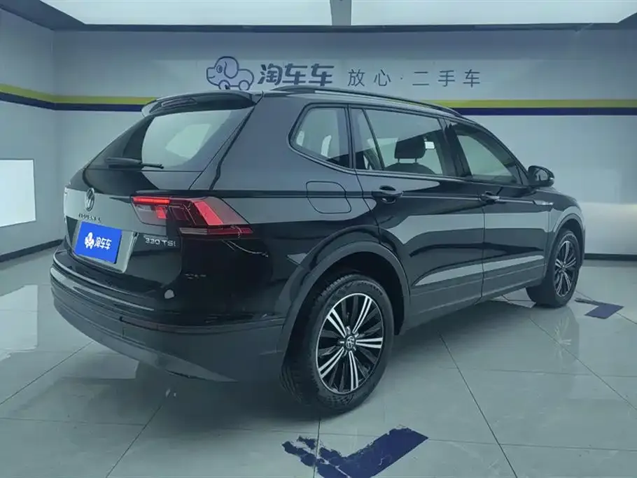 Volkswagen Tiguan L — фото 3