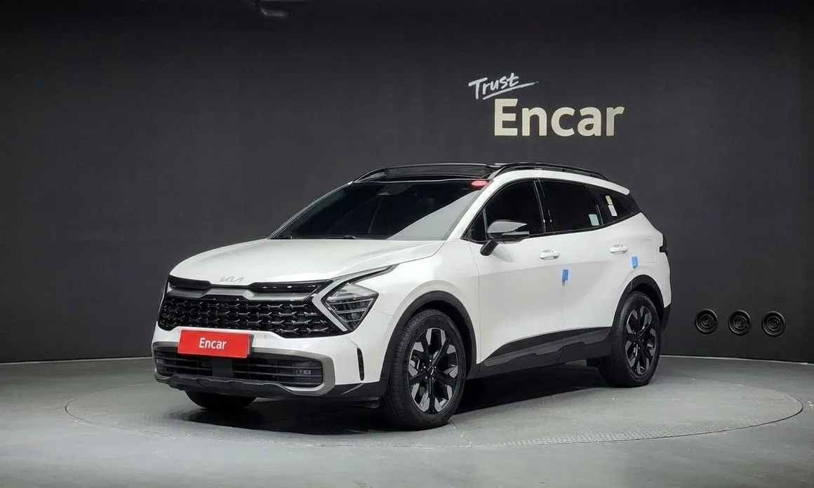 Kia Sportage — фото 1