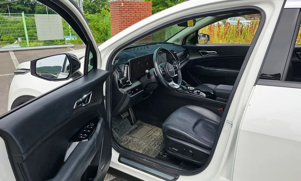 Kia Sportage — фото 7