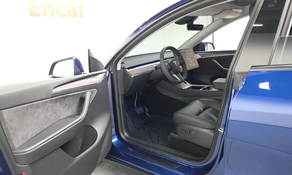 Tesla Model Y — фото 10