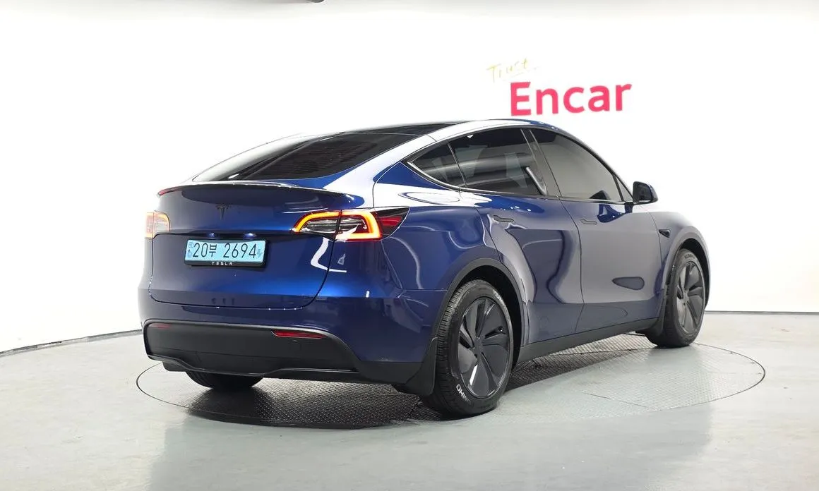 Tesla Model Y — фото 7