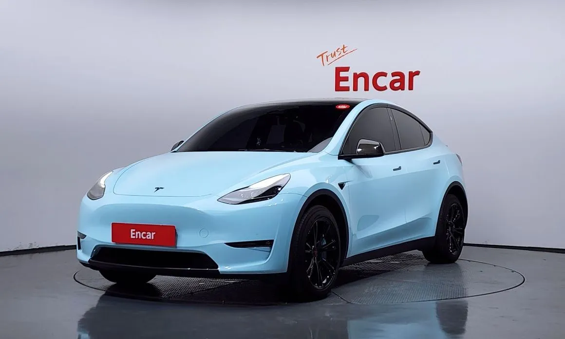 Tesla Model Y — фото 1