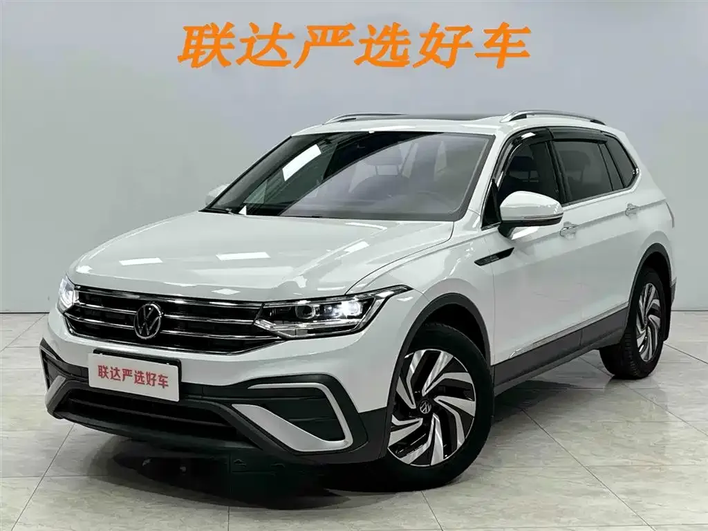 Volkswagen Tiguan L — фото 1
