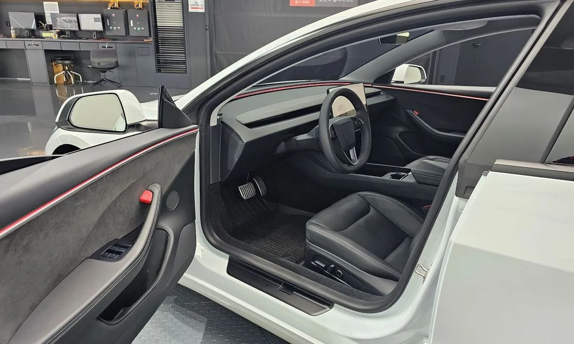 Tesla Model 3 — фото 9