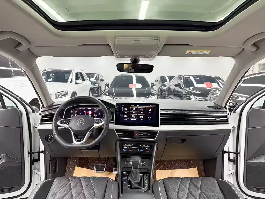Volkswagen Tiguan L — фото 5